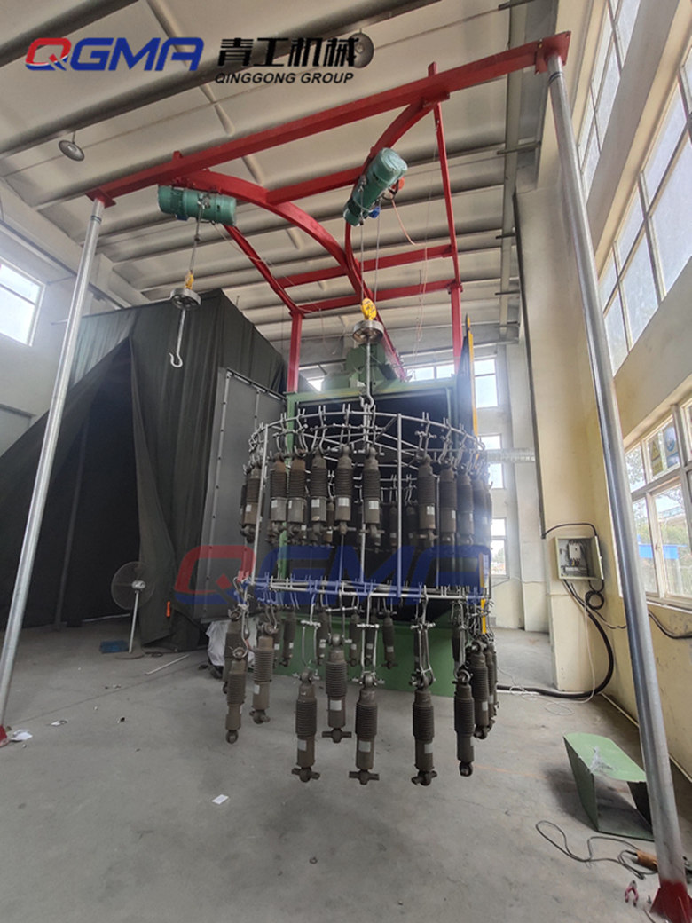 青島青工機械雙吊鉤式拋丸機助力于中國中車減震裝置拋丸清理